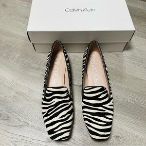 Calvin Klein size 9 zebra striped flats, made in USA of real calf fur, with box
